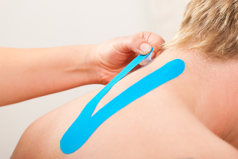 Image of man with Kinesio taping applied